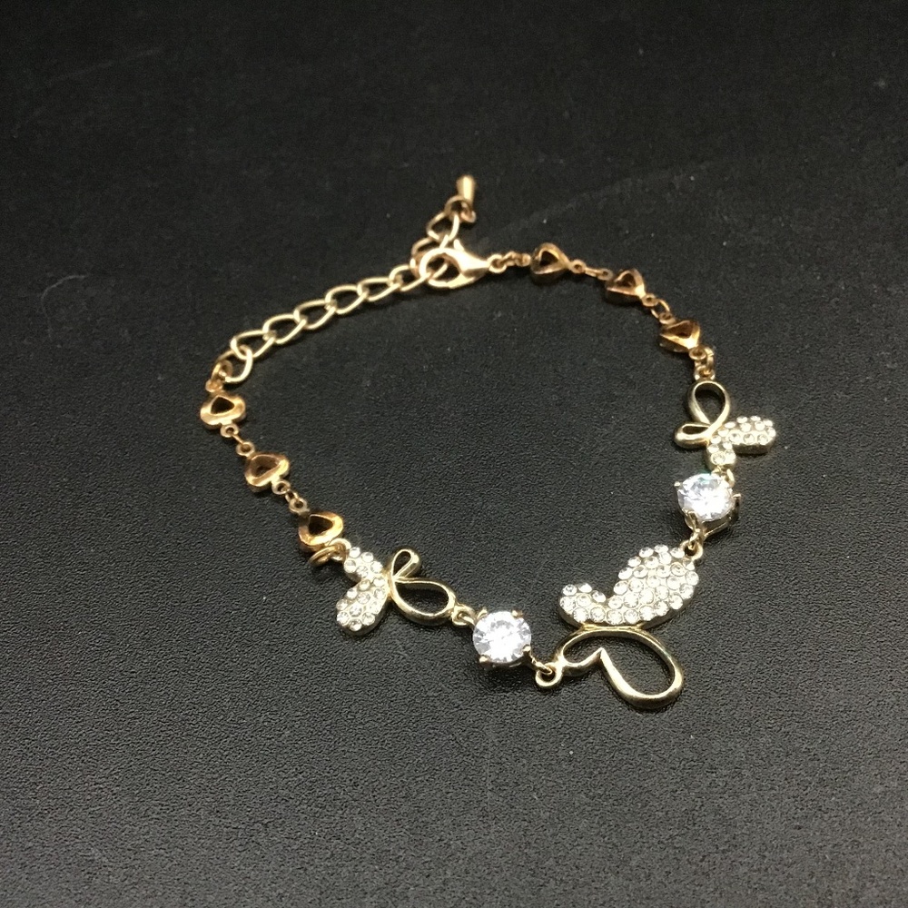 Gold and Brass tone Butterflies with Crystals Bracelet